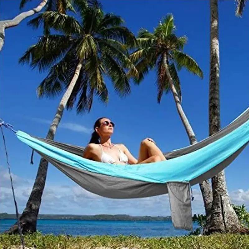 Light double nylon camping hammock with straps. Great for trips, beach, yard & garden. by eprolo