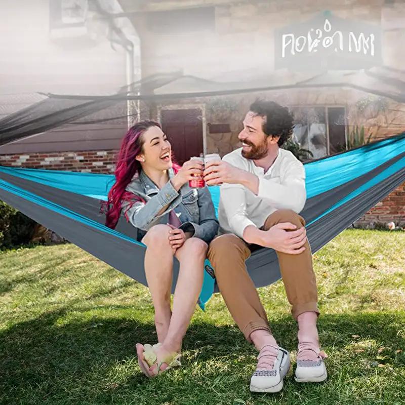 Light double nylon camping hammock with straps. Great for trips, beach, yard & garden. by eprolo